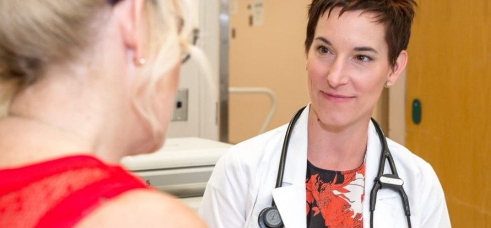 Doctor listening to patient