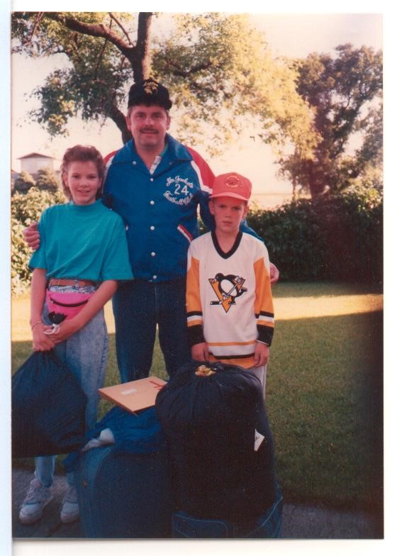 Sarah with her dad and brother