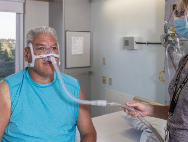 Getting fitted with CPAP mask