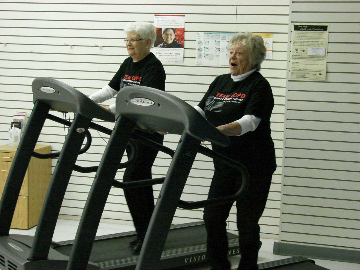 two women on a treadmill