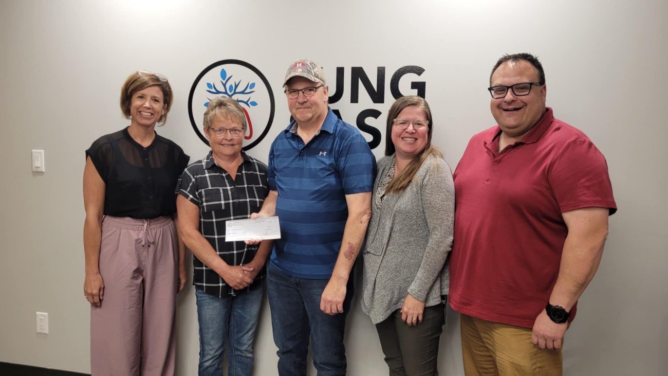 Ralph and Brenda Harris presenting Lung Sask staff with cheque from 3rd party fundraiser