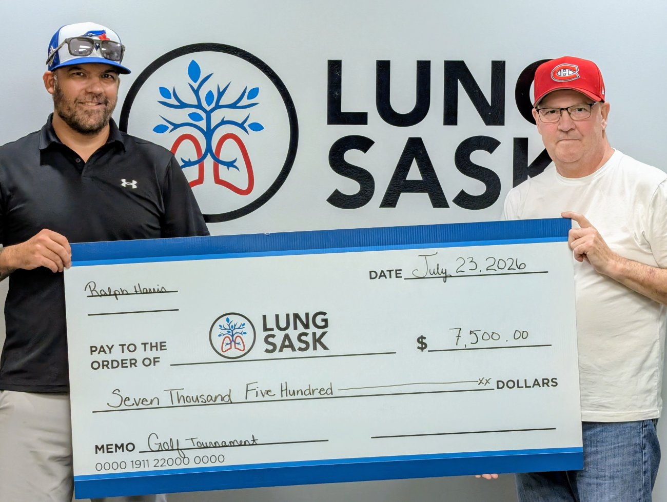 Adam and Ralph Harris Cheque Presentation