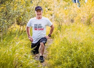 Dale exercising and smiling