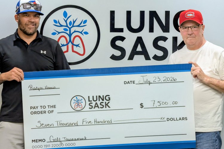 Adam and Ralph Harris Cheque Presentation