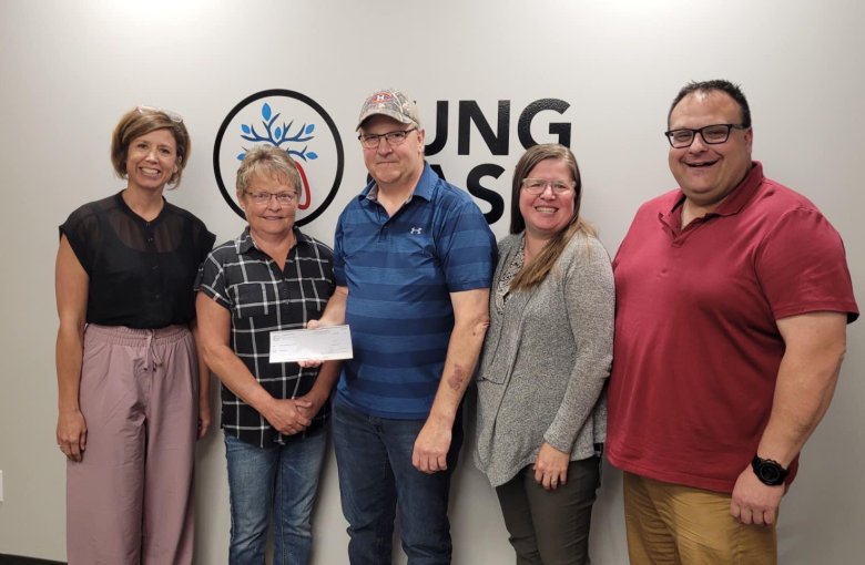 Ralph and Brenda Harris presenting Lung Sask staff with cheque from 3rd party fundraiser