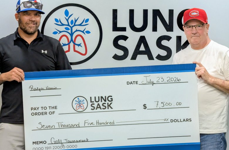 Adam and Ralph Harris Cheque Presentation